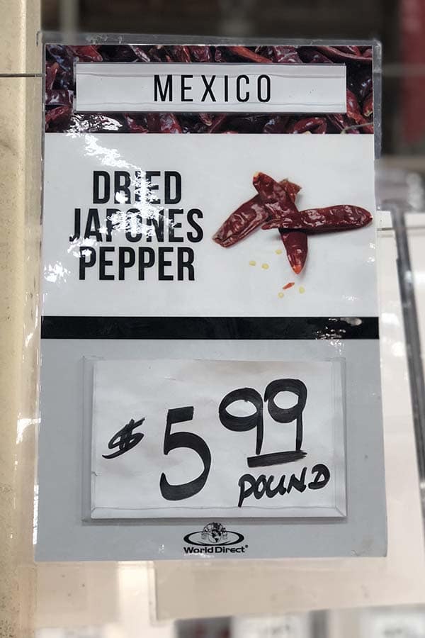 grocery store sign for Dried Japones Peppers 