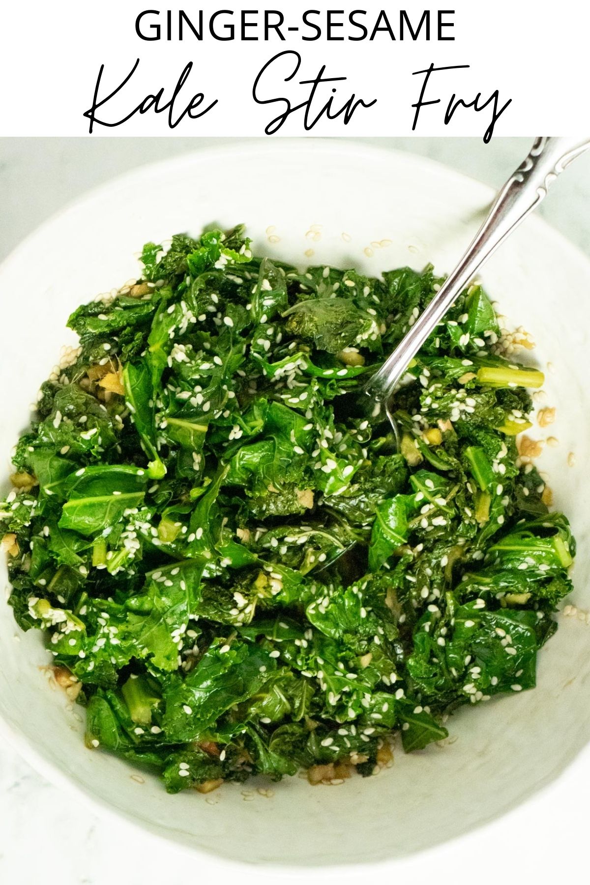 close-up of ginger-sesame kale stir fry in a serving bowl