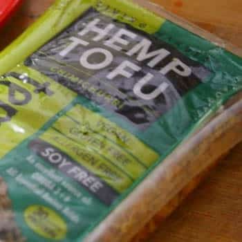 package of hemp tofu on a wooden countertop