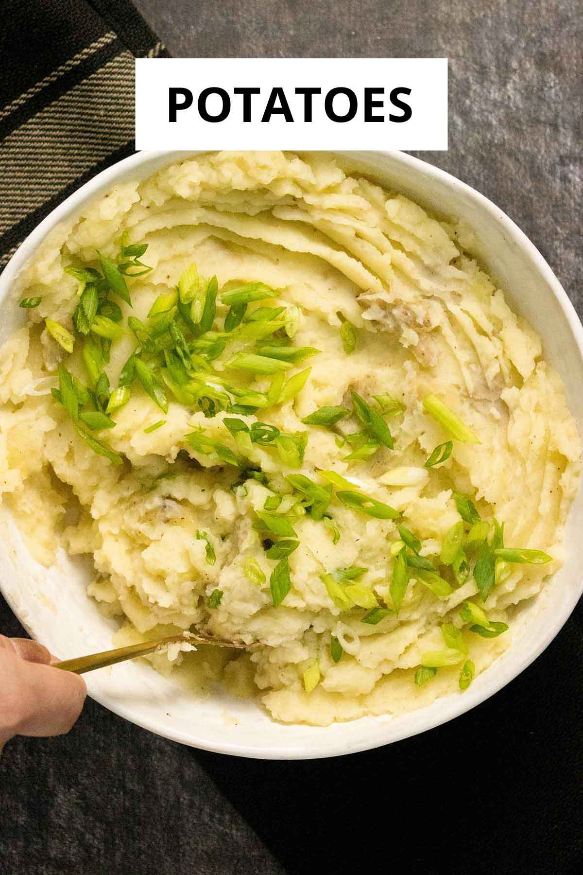hand stirring mashed potatoes
