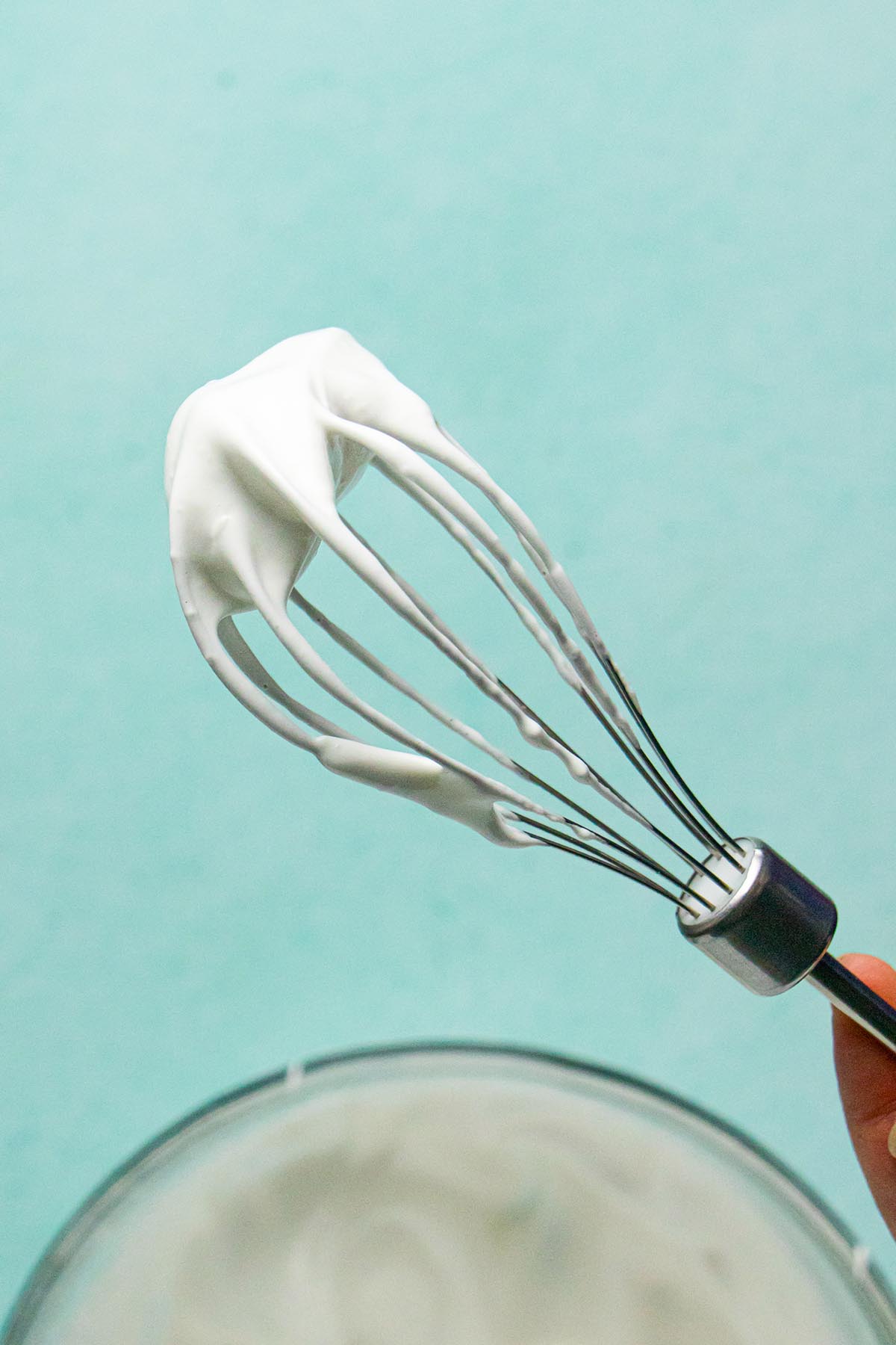 whisk with aquafaba on the tip, so you can see the texture of the soft peaks