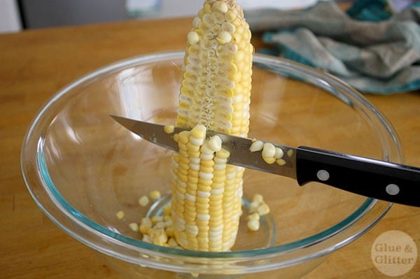 Try this easy, less-mess method for getting the kernels off of an ear of corn!