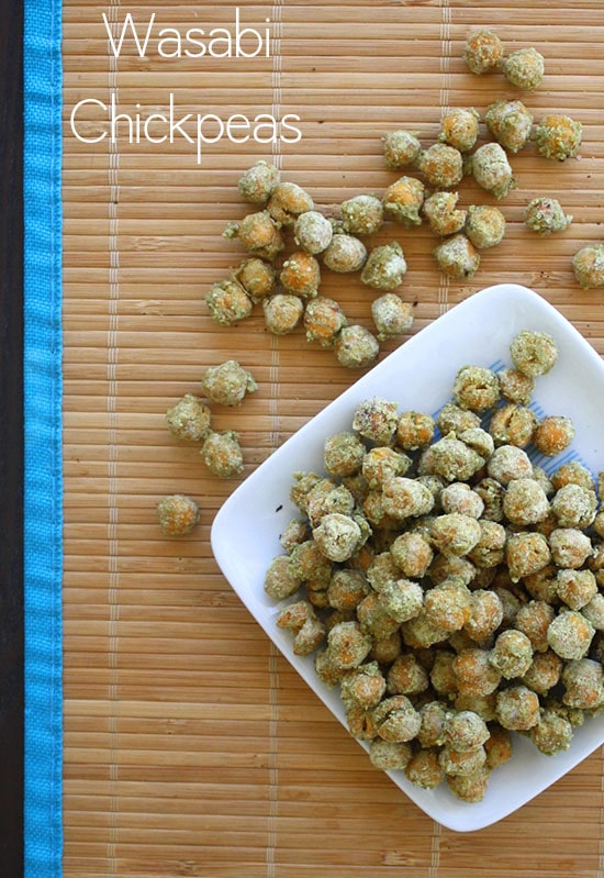 wasabi chickpeas on a serving dish on a wooden table, text overlay