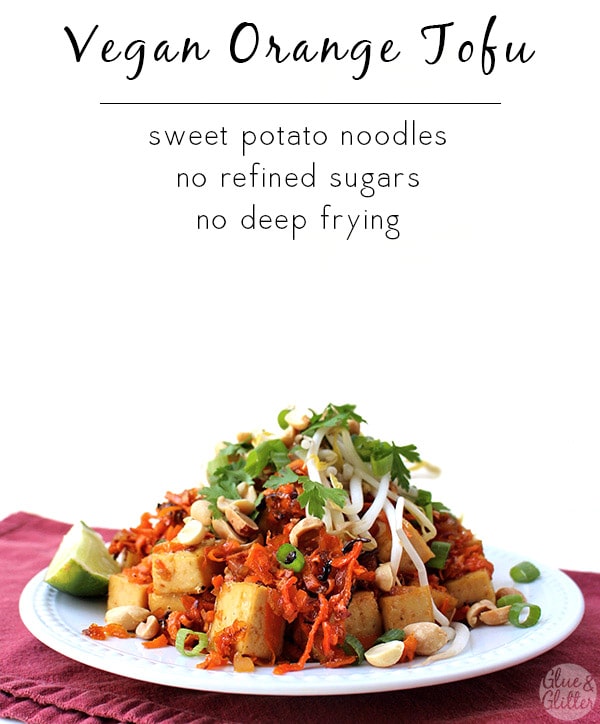 orange tofu over sweet potato noodles with peanuts, green onion, and bean sprouts, lime wedge on the side, text overlay