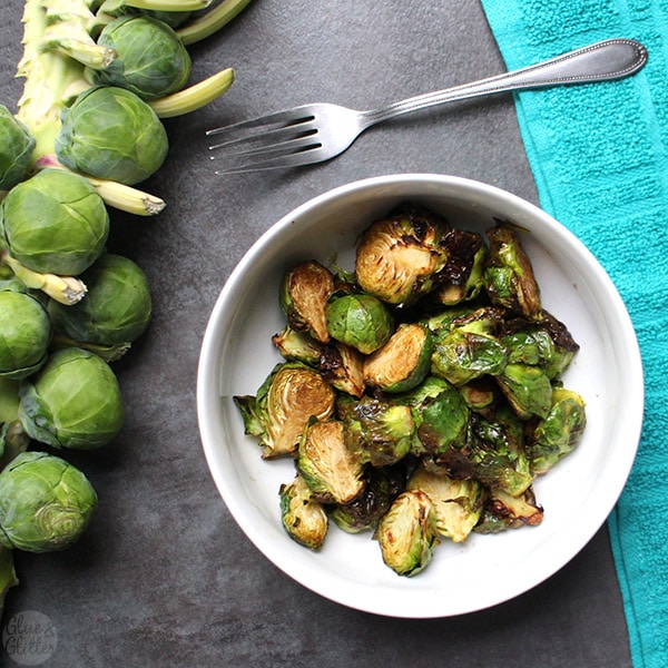 You guys, I am so excited to share my latest recipe: perfect, crispy-on-the-outside, tender-on-the-inside air fryer Brussels sprouts.