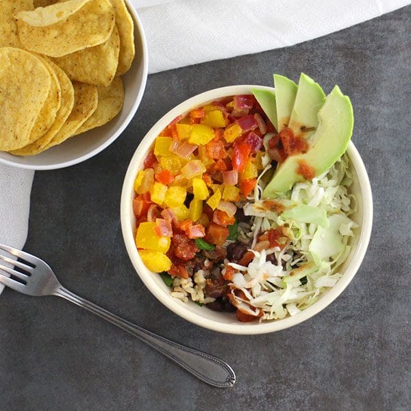 Tangy, slightly spicy, and so, so easy. This flavor-packed Chipotle-Lime Burrito Bowl is going to knock your socks off!