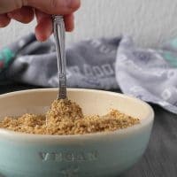scooping up vegan Italian breadcrumbs with a spoon