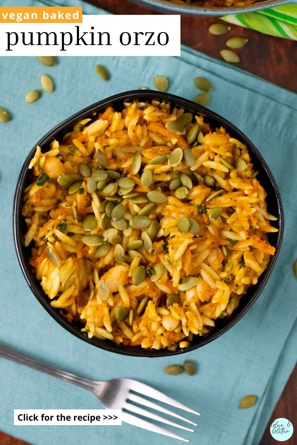 bowl of vegan orzo in pumpkin sauce topped with pumpkin seeds, text overlay