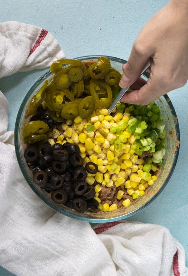 vegan pinwheel filling ingredients in a mixing bowl