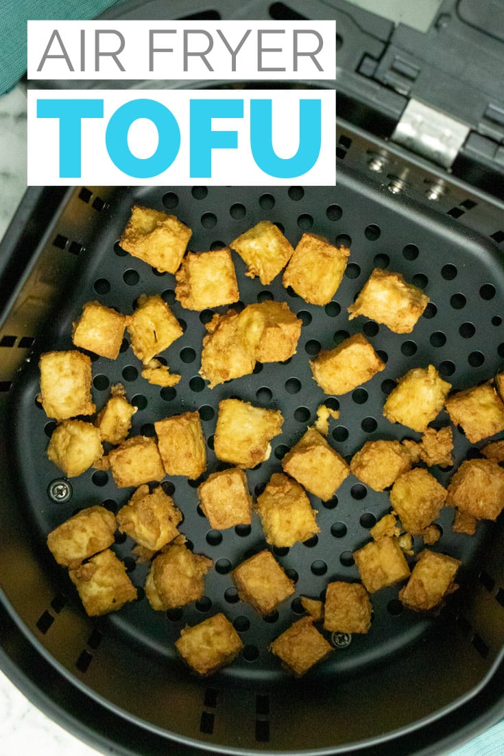basket of air fryer tofu with a text overlay