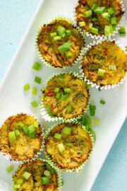 tray of vegan potato cakes on a blue table