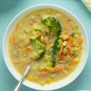 bowls of Instant Pot vegan corn chowder on a blue table