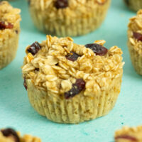 close-up of a baked oatmeal cup with dried cranberries