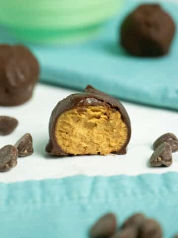 close-up of a vegan peanut butter cup with a bite out of it