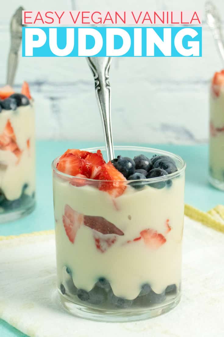 glasses of vegan vanilla pudding layered with strawberries and blueberries, text overlay