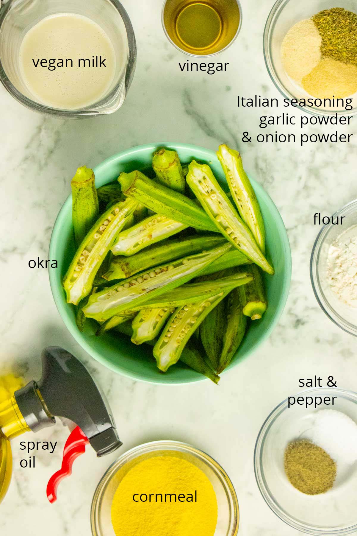 air fryer okra ingredients in bowls on a white table