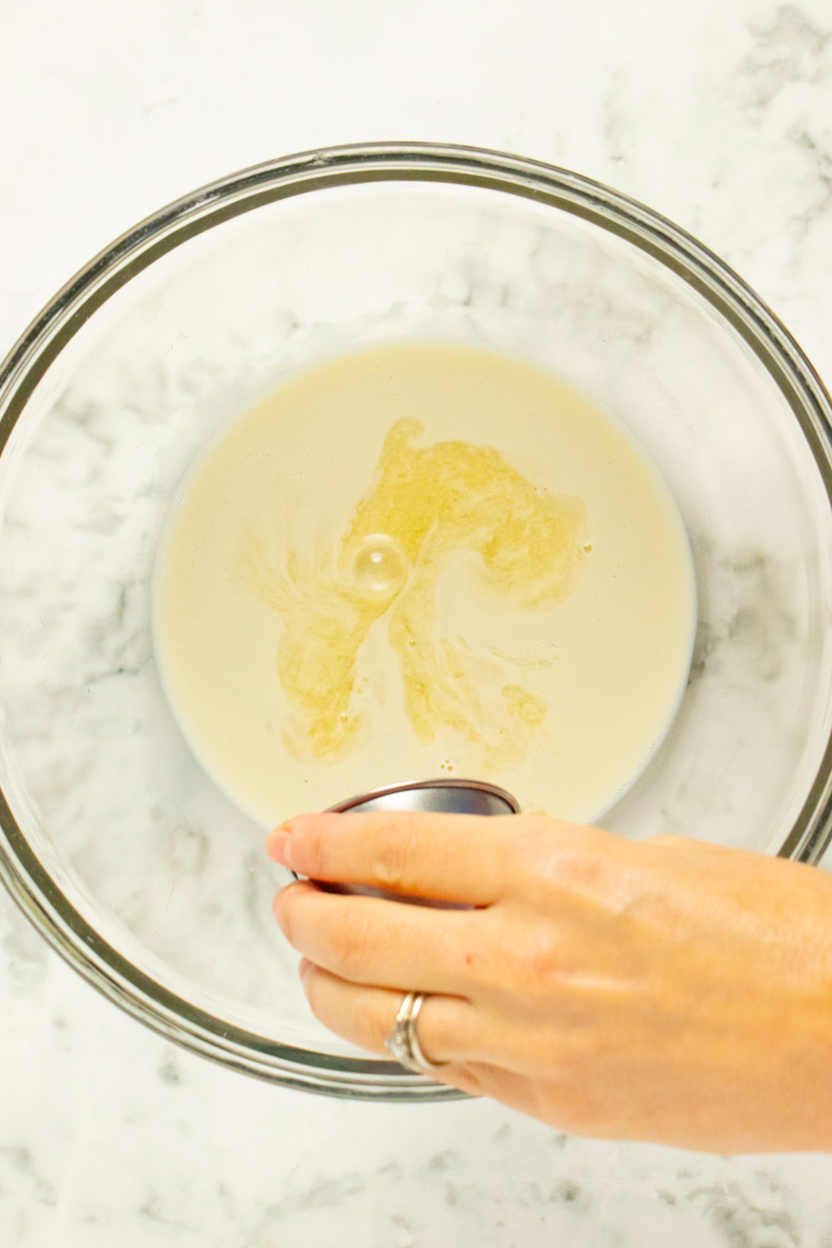 adding the vinegar to the non-dairy milk
