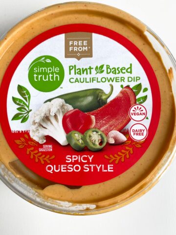 package of Simple Truth Plant Based Queso Dip on a white table