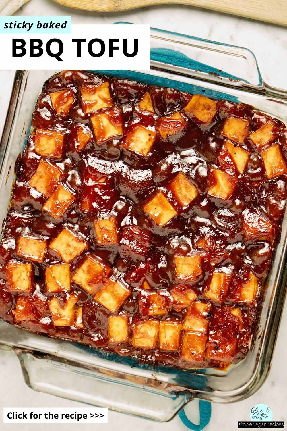 baked bbq tofu in a pan, after baking, text overlay