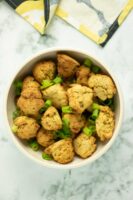 air fryer hush puppies in a bowl on a marble table