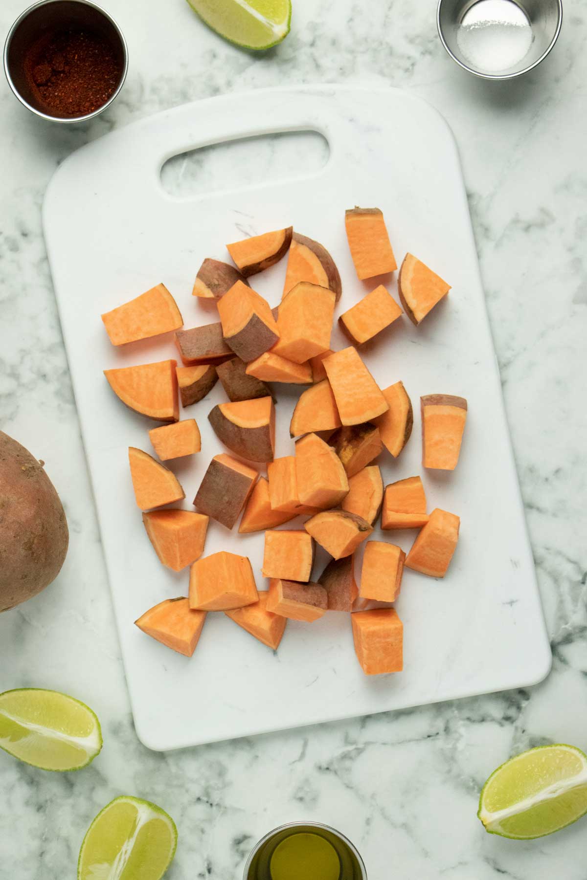 cubed sweet potato on a cutting board