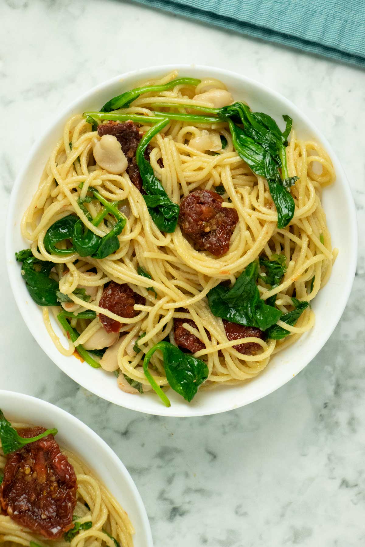 spaghetti with spinach, basil, beans, and sun dried tomatoes