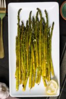 air fryer asparagus on a white serving plate