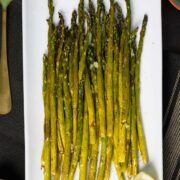 air fryer asparagus on a white serving plate