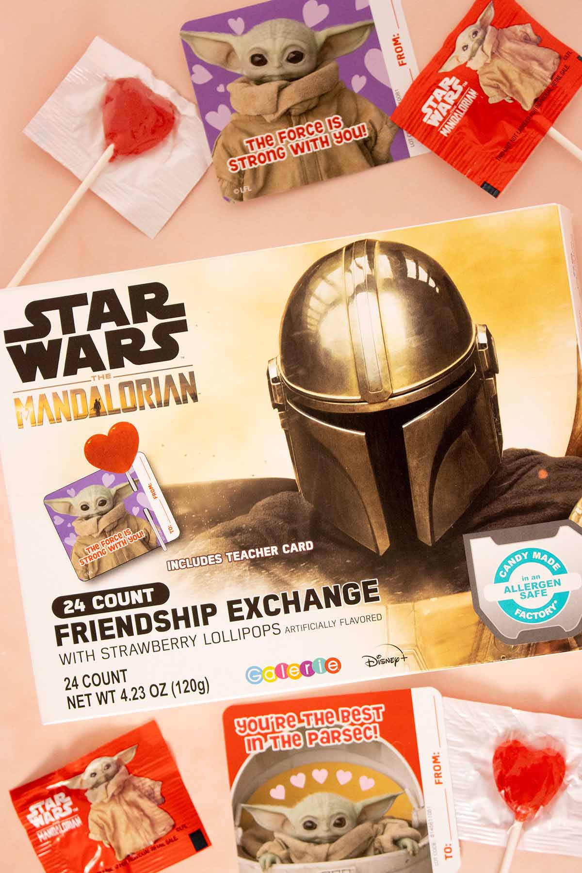 box of mandalorian valentines with the heart lollipops and valentines out around it