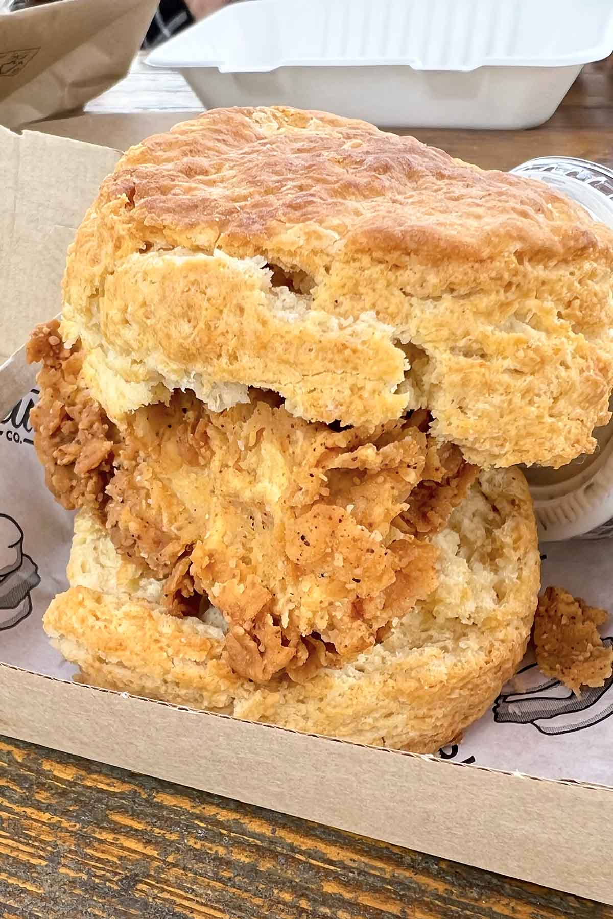vegan chicken biscuit in a cardboard food box