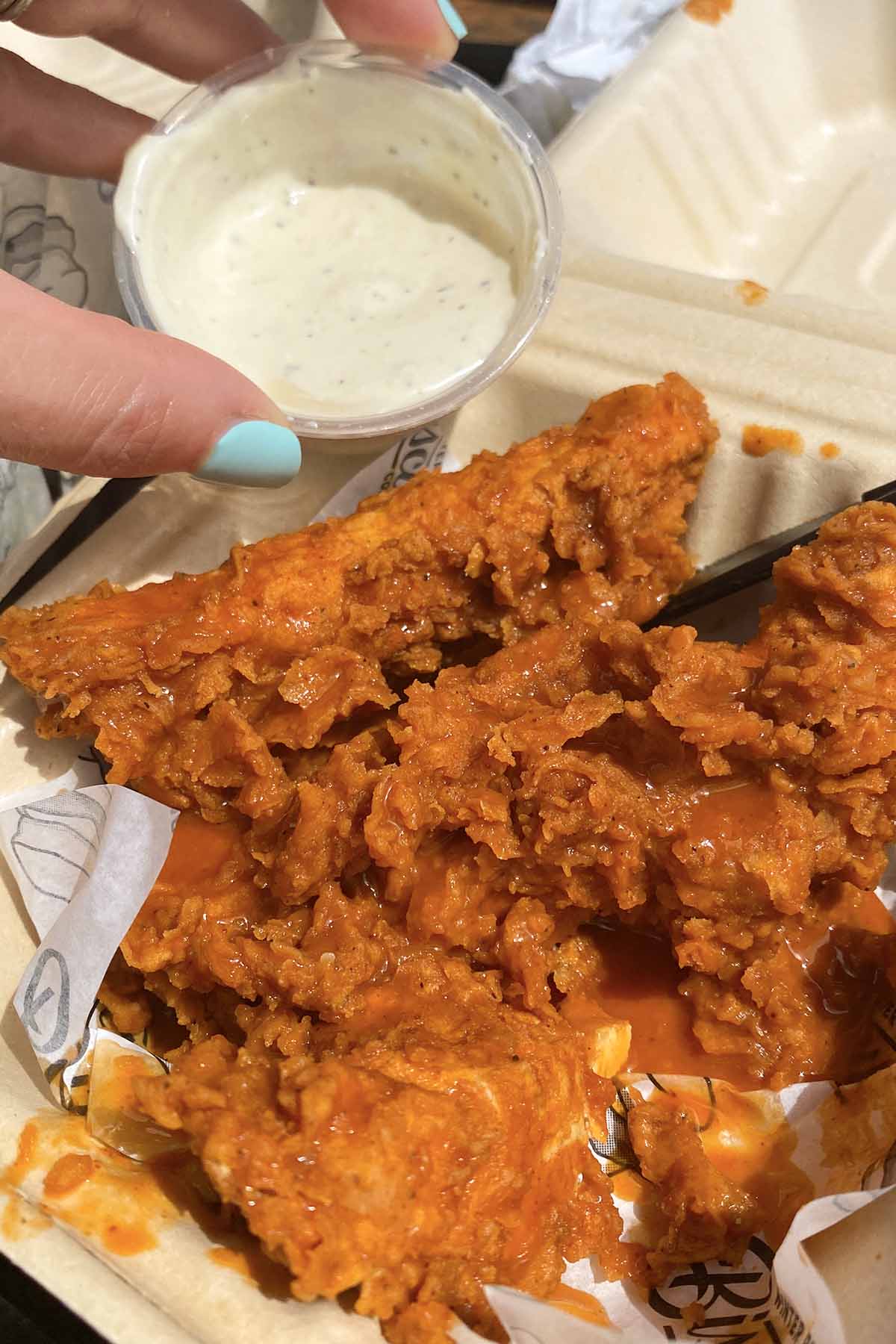 Winter Park Biscuit Company Chik Strips with buffalo sauce and ranch dressing