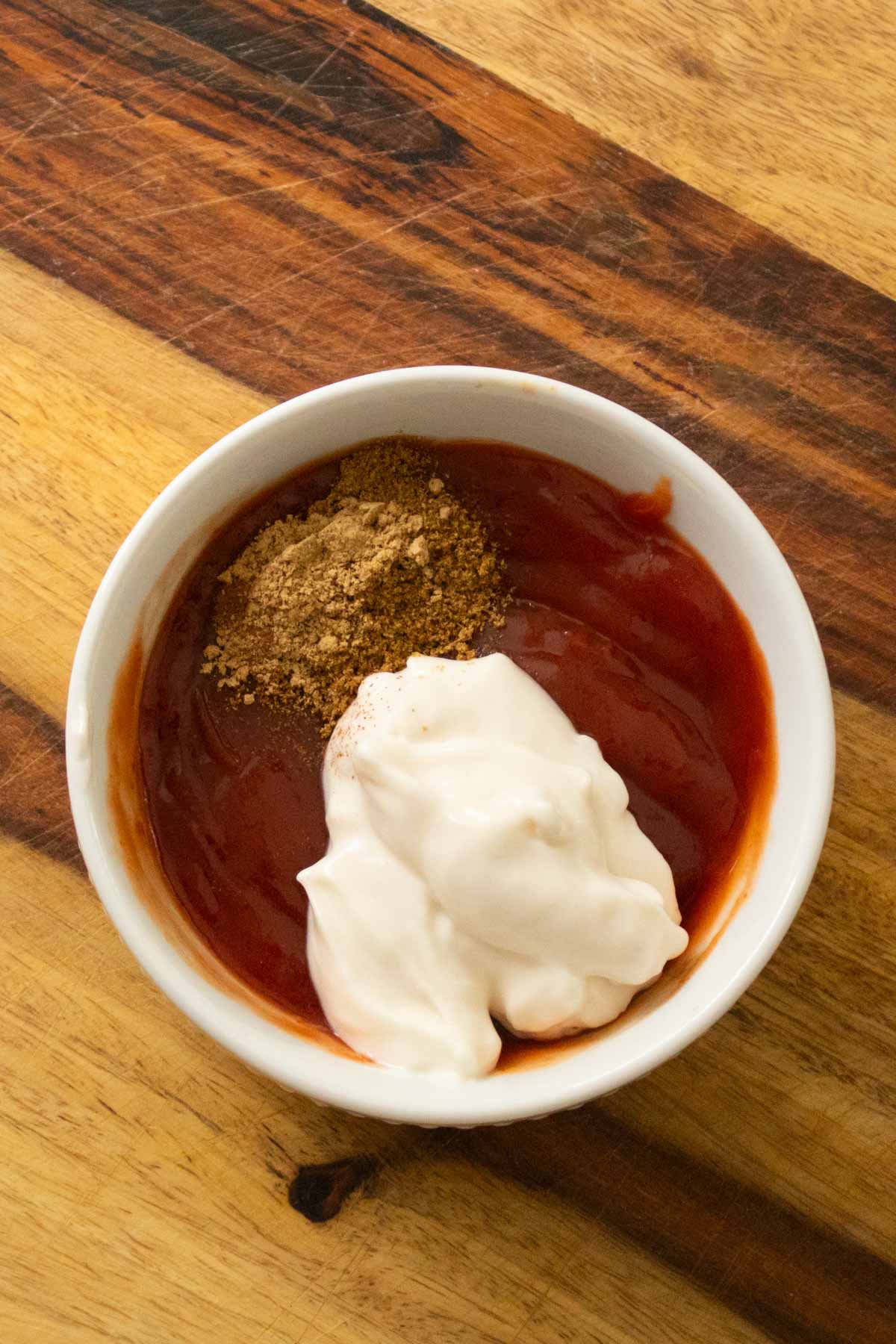 cumin ketchup ingredients in the bowl before mixing