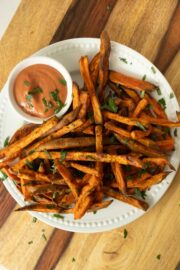 plate of curried sweet potato fries with the dipping sauce