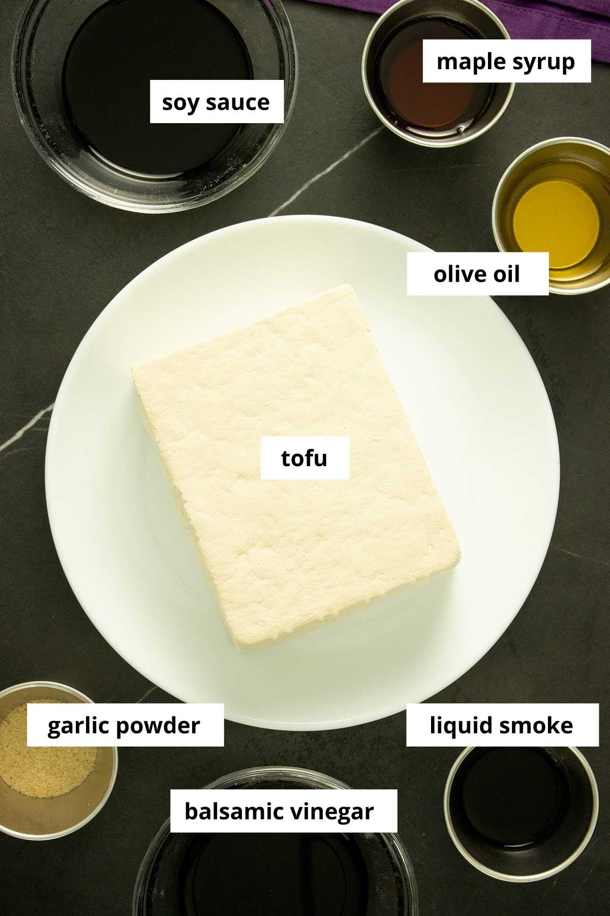 tofu and flavorings in containers on a table, labeled with text