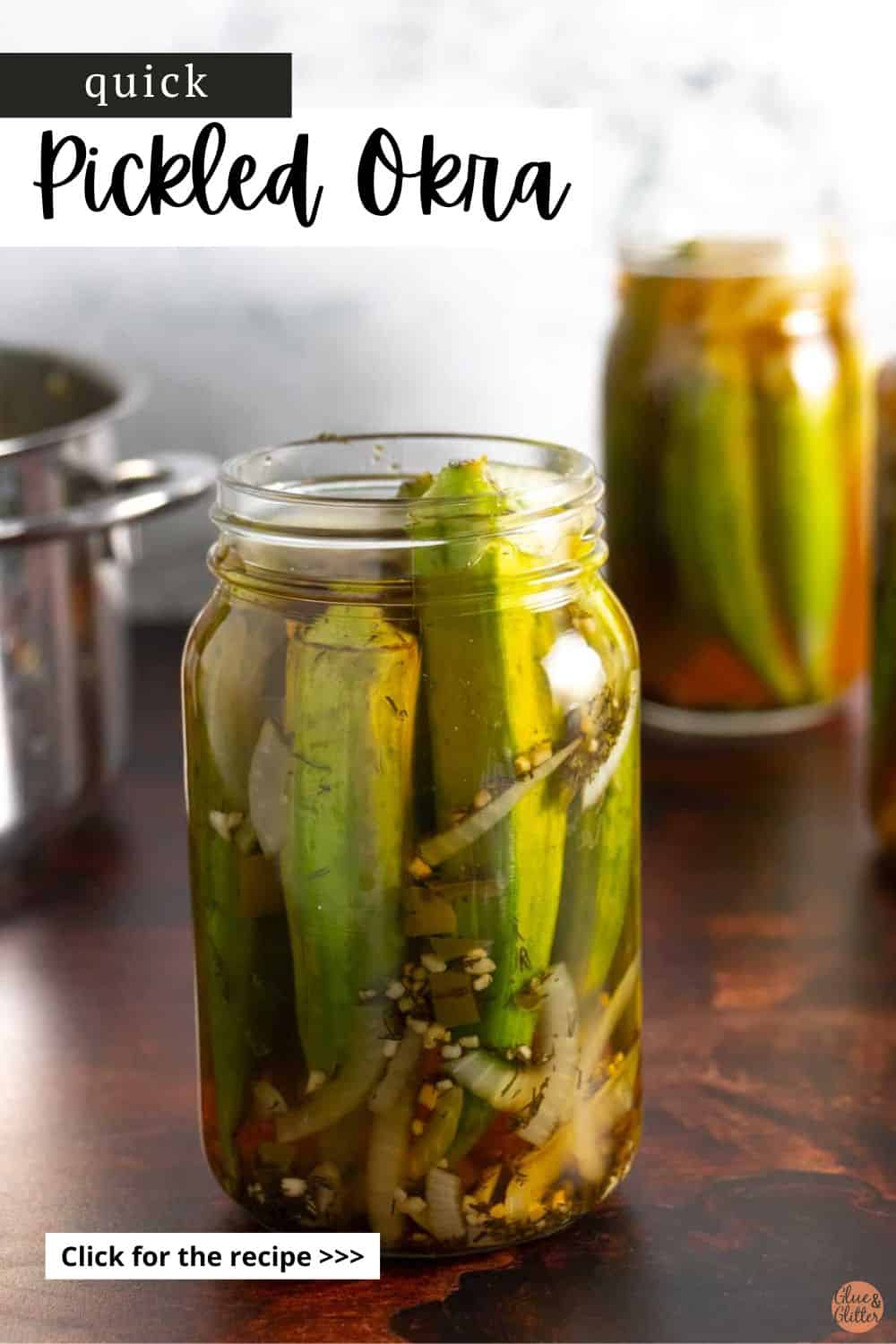 jars of okra refrigerator pickles on a wooden table