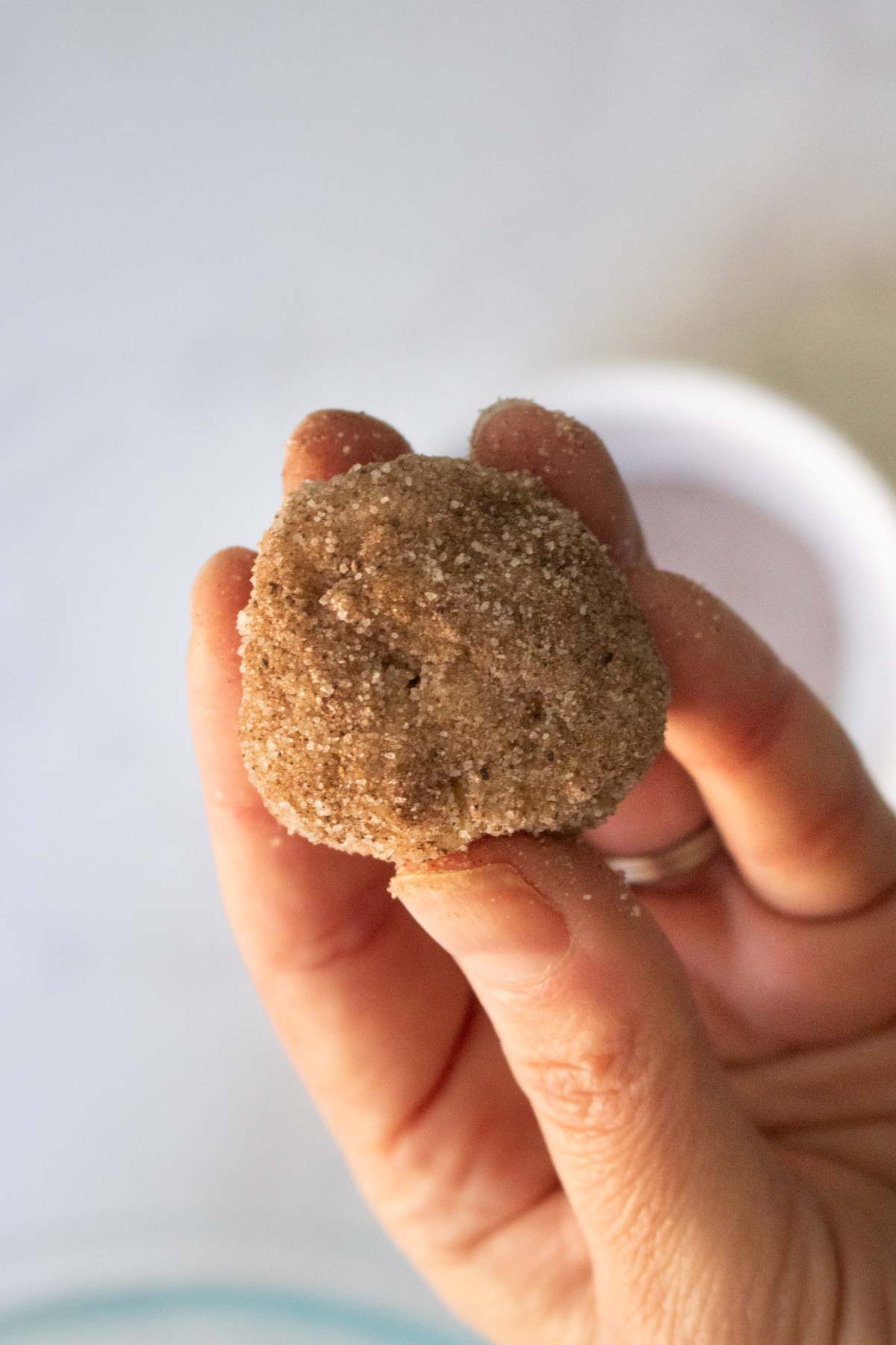 dough ball coated in cinnamon sugar