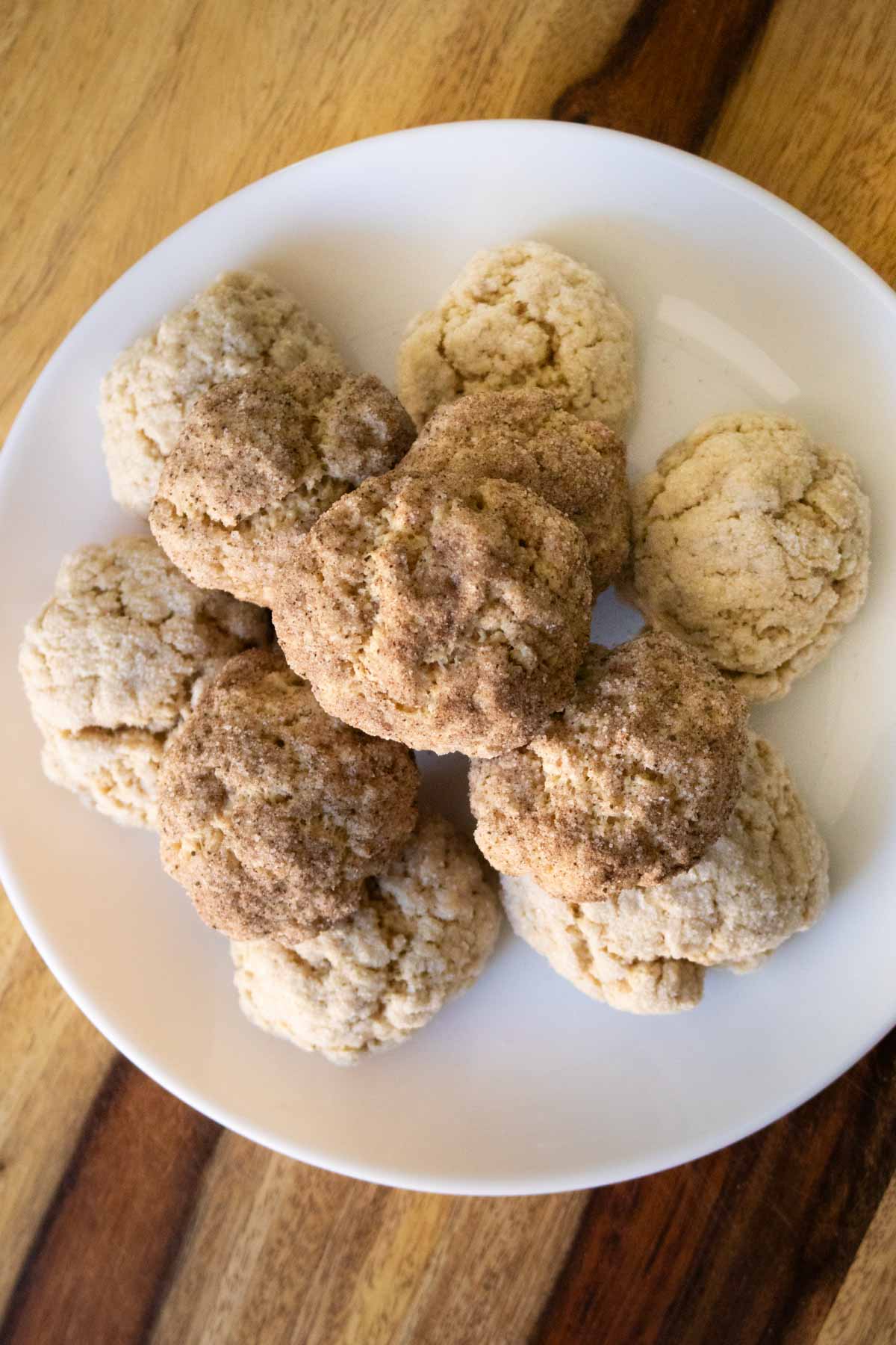 air fryer donut holes on a plate before icing