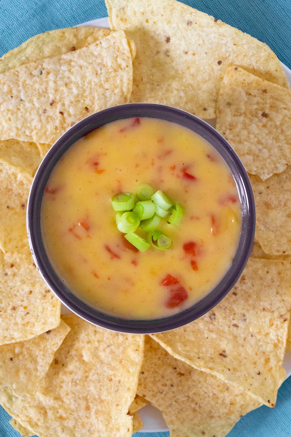 bowl of nut-free vegan queso with chips