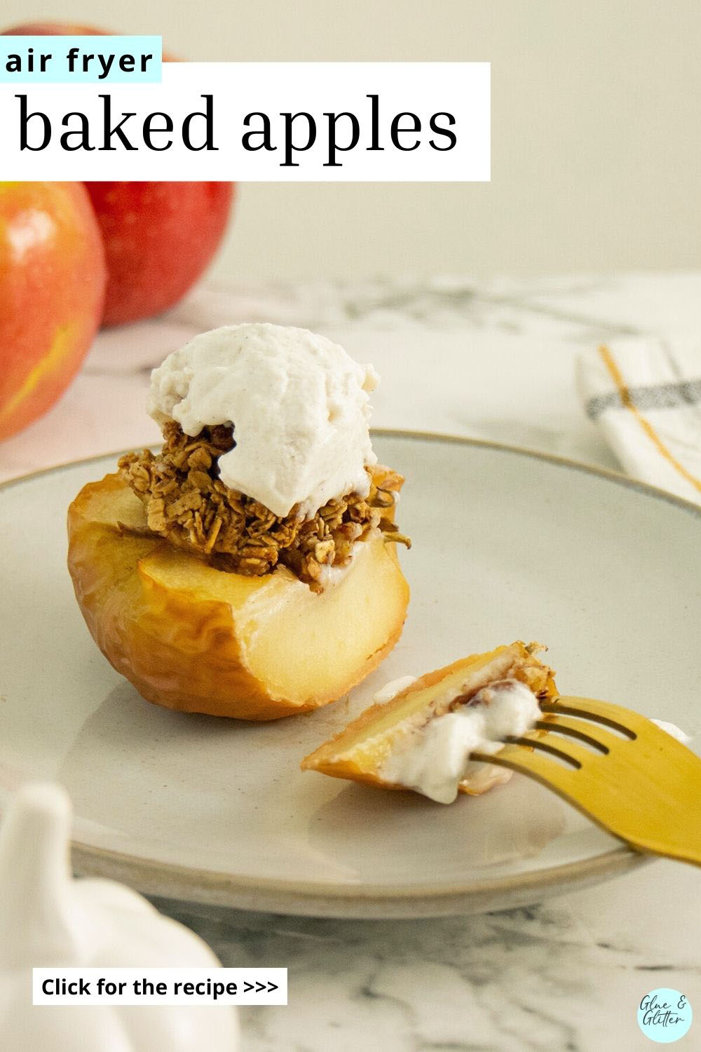 baked apple on a plate with vegan vanilla ice cream on it, text overlay