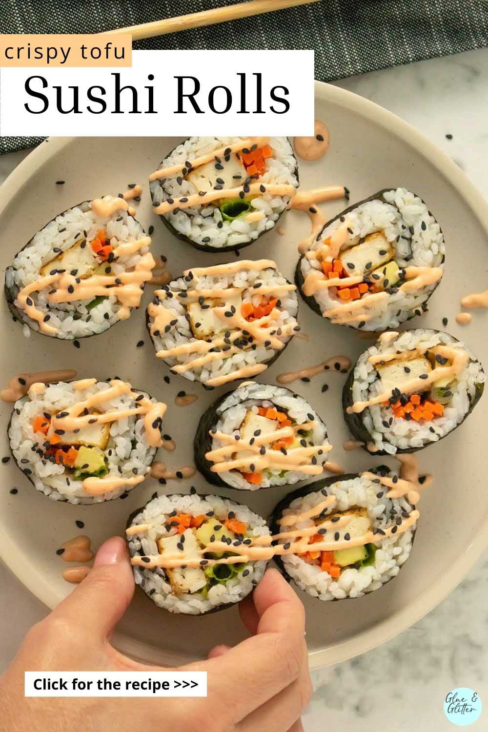 plate of tofu sushi topped with sriracha mayo and black sesame seeds, text overlay