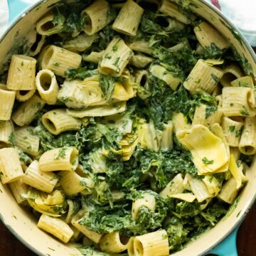 vegan spinach artichoke pasta in a pot