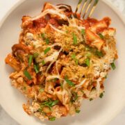 vegan baked ziti on a plate with a fork