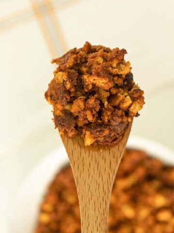 close-up of the tofu sausage crumbles on a serving spoon