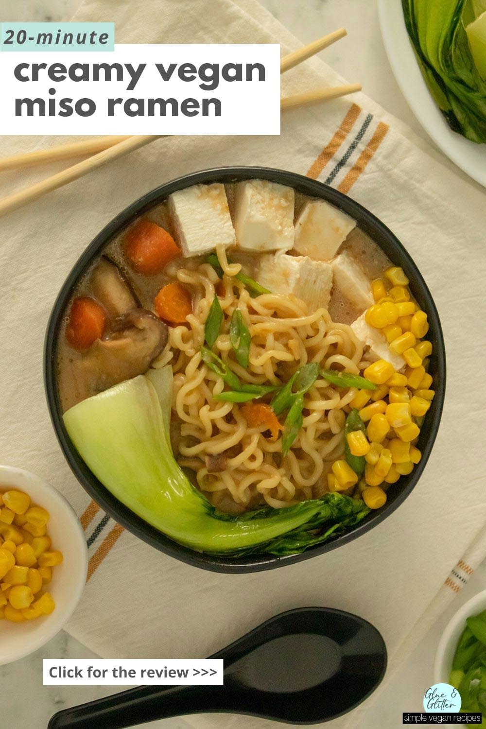 creamy vegan miso ramen in a bowl with bok choy, corn, tofu, carrots, and mushrooms. Text overlay.