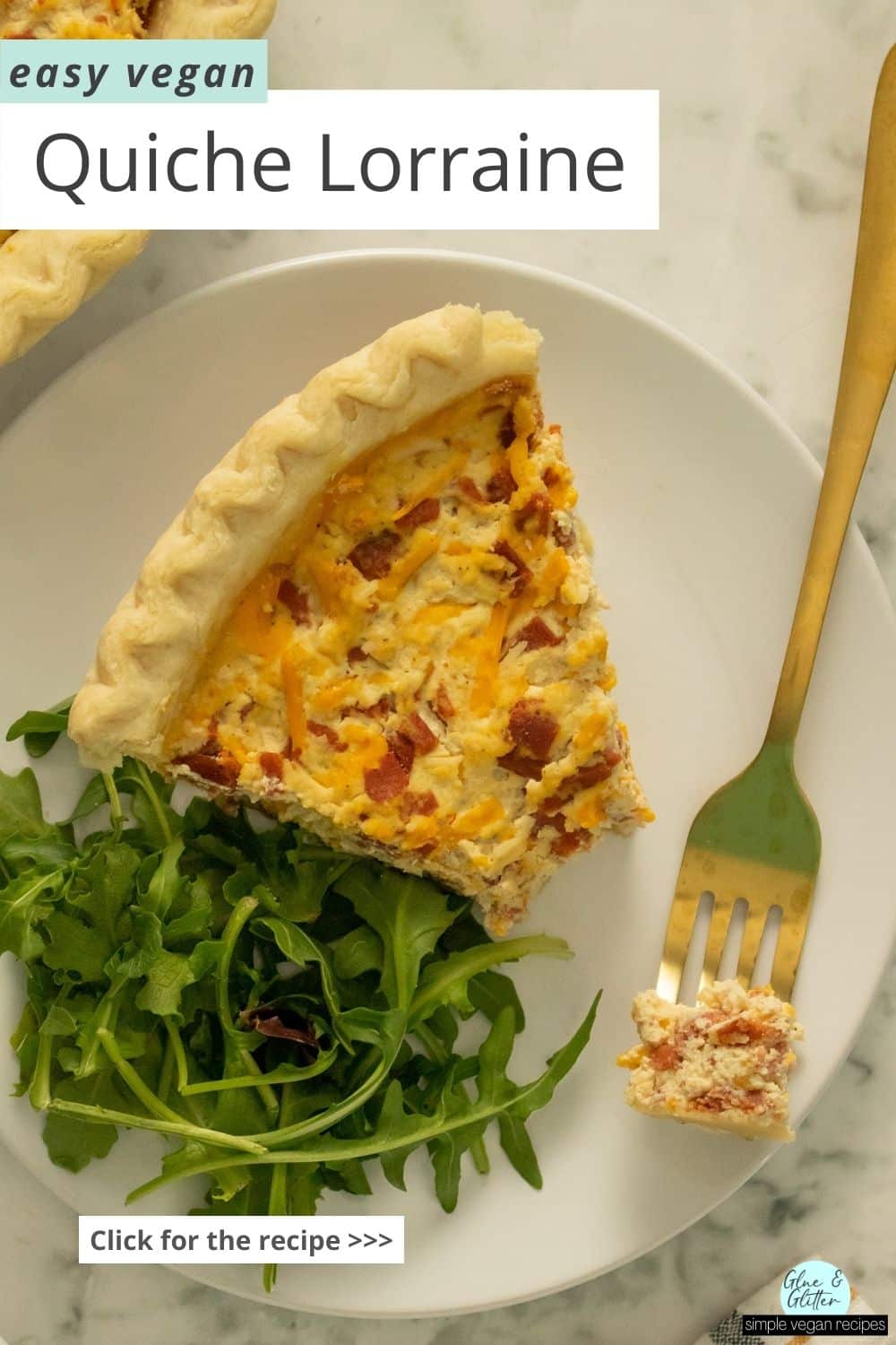 vegan quiche Lorraine on a white plate with a salad. A bite is on a fork. Text overlay.