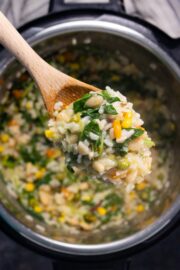 wooden spoon serving Instant Pot vegan risotto
