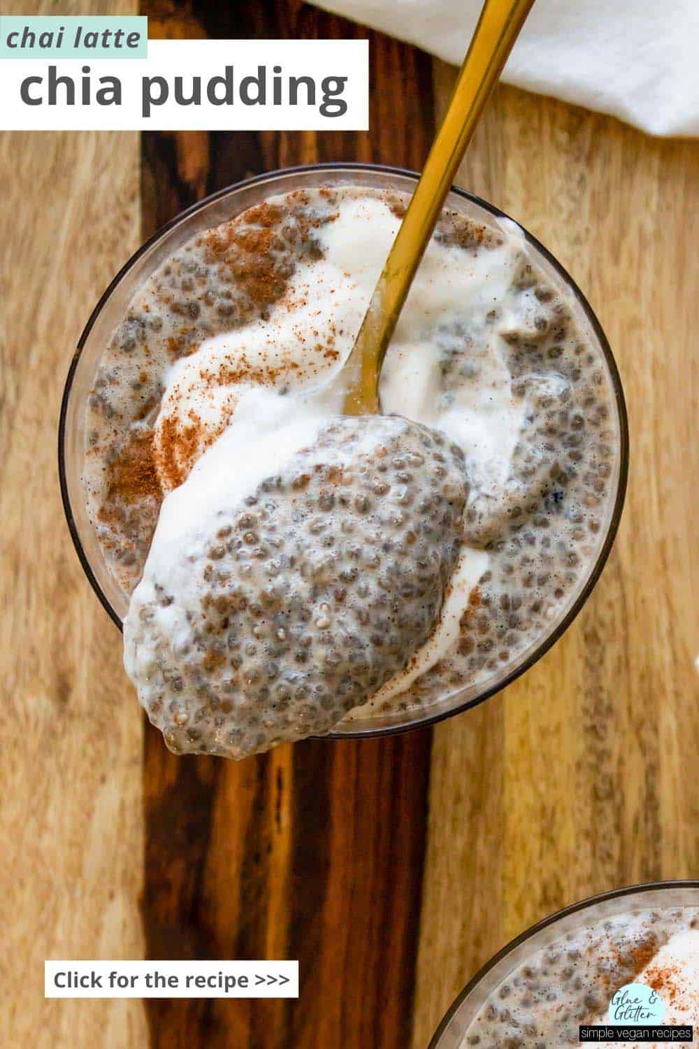 close-up of a spoonful of chai chia pudding resting on a glass, text overlay