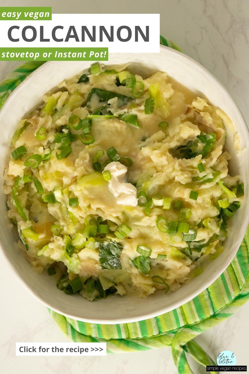 serving bowl of vegan colcannon with a pat of butter and green onions on it, text overlay
