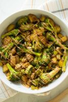 roasted potatoes and broccoli with tahini miso dressing drizzled generously on top