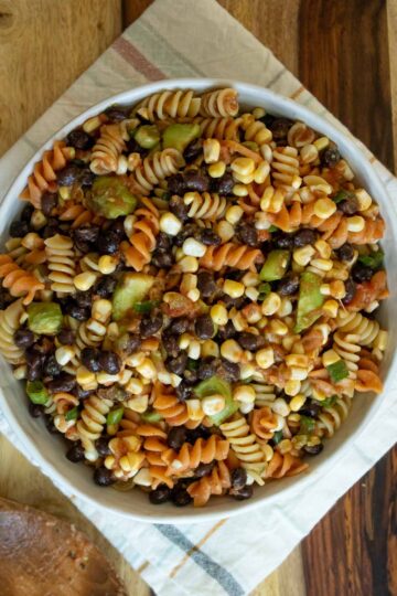 southwest pasta salad in a serving bowl on a wooden table